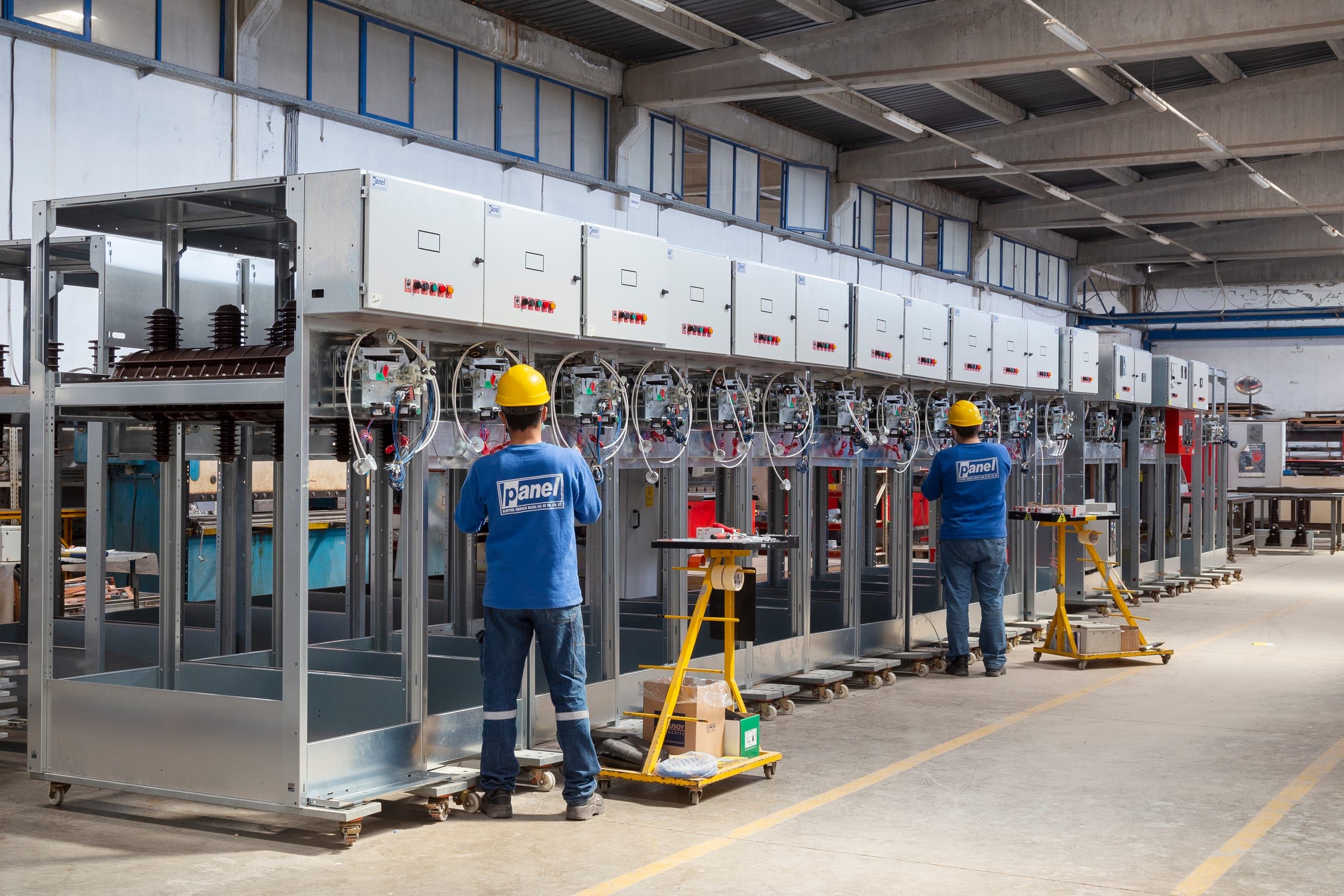 Technicians assembling medium voltage switchgear on the Panel Elektrik production line